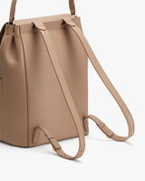 Backpack with adjustable straps and a visible handle.