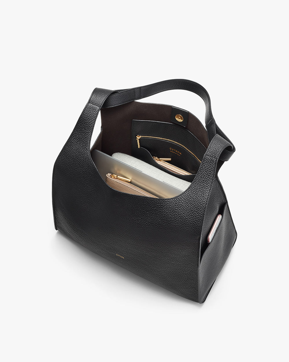 Open handbag with visible contents inside.