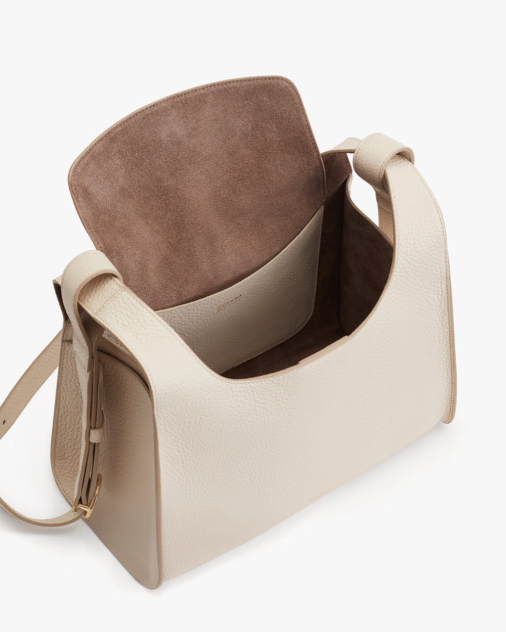 Double Loop Bag Open handbag with visible interior standing upright.