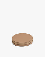 Round case with a zipper on a plain background.