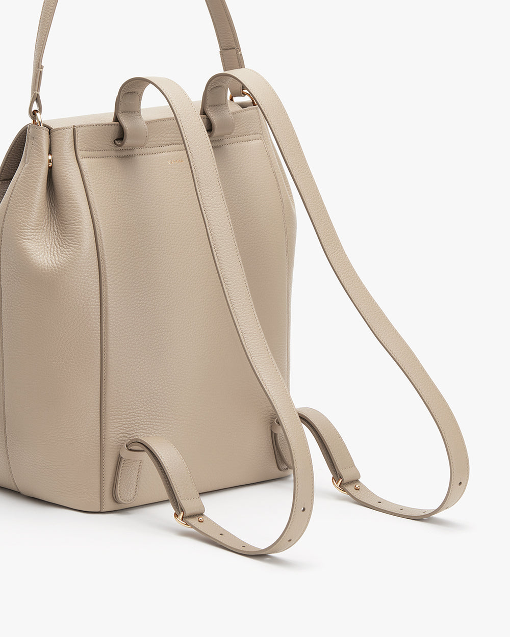 Leather Backpack 13-inch Leather backpack with handles and a shoulder strap standing upright.