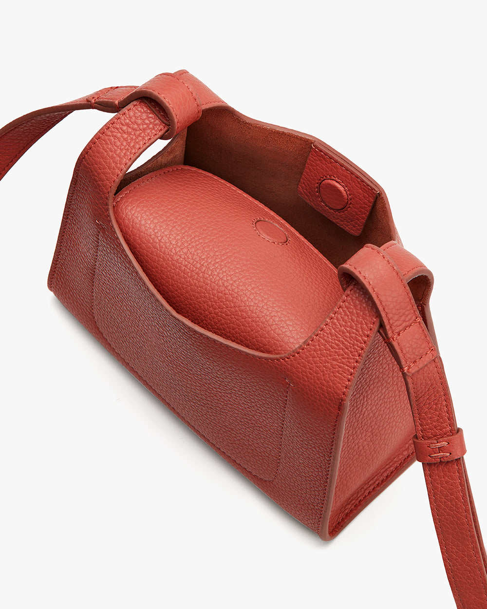 Open handbag with a shoulder strap and visible inner compartment.