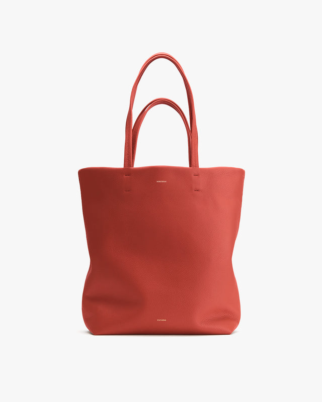 A tote bag with two handles, standing upright.