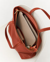 Open bag with zipper showing inner compartments