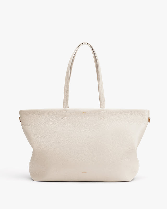 Large handbag with two handles and a minimal design.