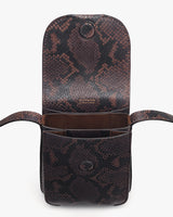 Snake print cell phone case with flap open and strap.