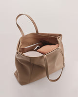 Open handbag with a visible wallet inside.