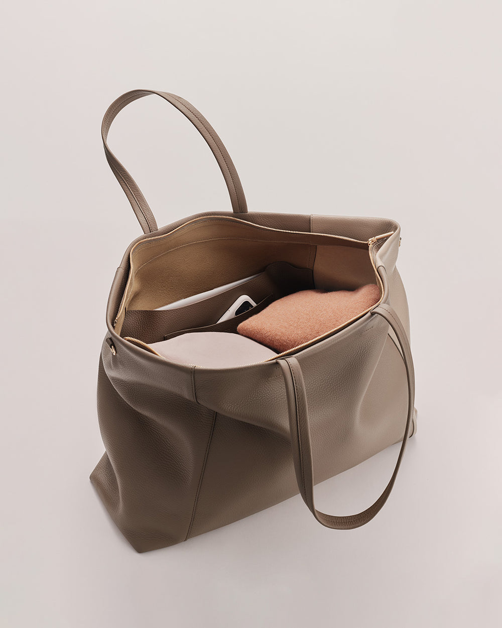 Easy Overnighter Bag Open tote bag with a book inside.