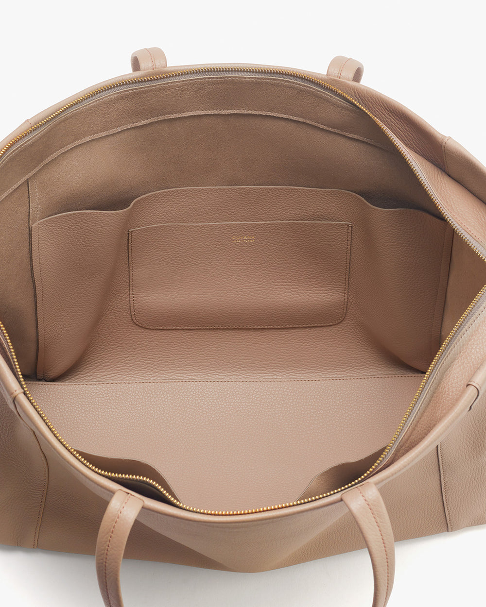 Easy Overnighter Bag Open handbag showing interior with pockets.