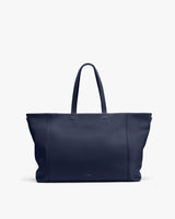 Large tote bag with two handles, standing upright.