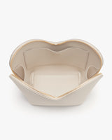 Open zippered pouch shaped like a flower from above.