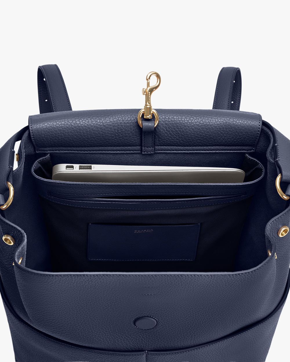 Leather Backpack 13-inch Open backpack with a laptop inside