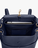 Open backpack with a laptop inside