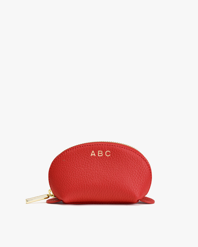 Small zippered pouch with the letters ABC on it.