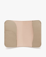 Open wallet showing interior with several slots.