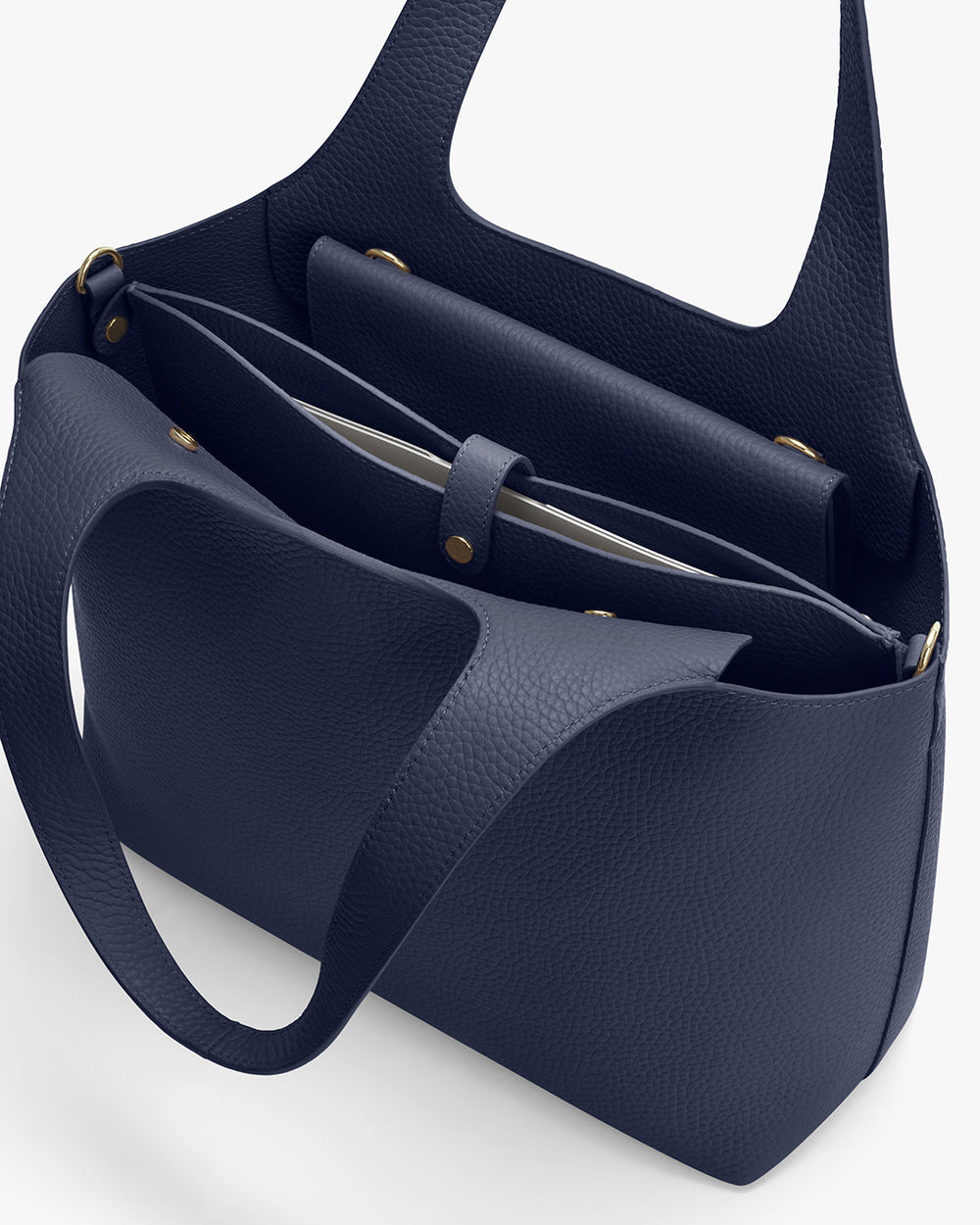 Open handbag with two handles and an inner zipper pocket.