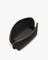 Top view of an open zipper bag with an interior pocket.