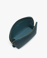 Open cosmetic bag with a zipper on a plain background.