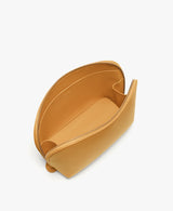 Open leather wallet on a plain background