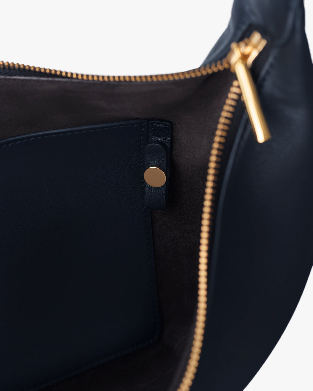 Open bag with visible zipper and interior pocket.