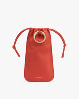 Small drawstring pouch with circular metal ring detail