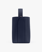 Rectangular leather pouch with a top handle strap.