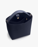 Open tote bag with rounded handles and small inner pocket.