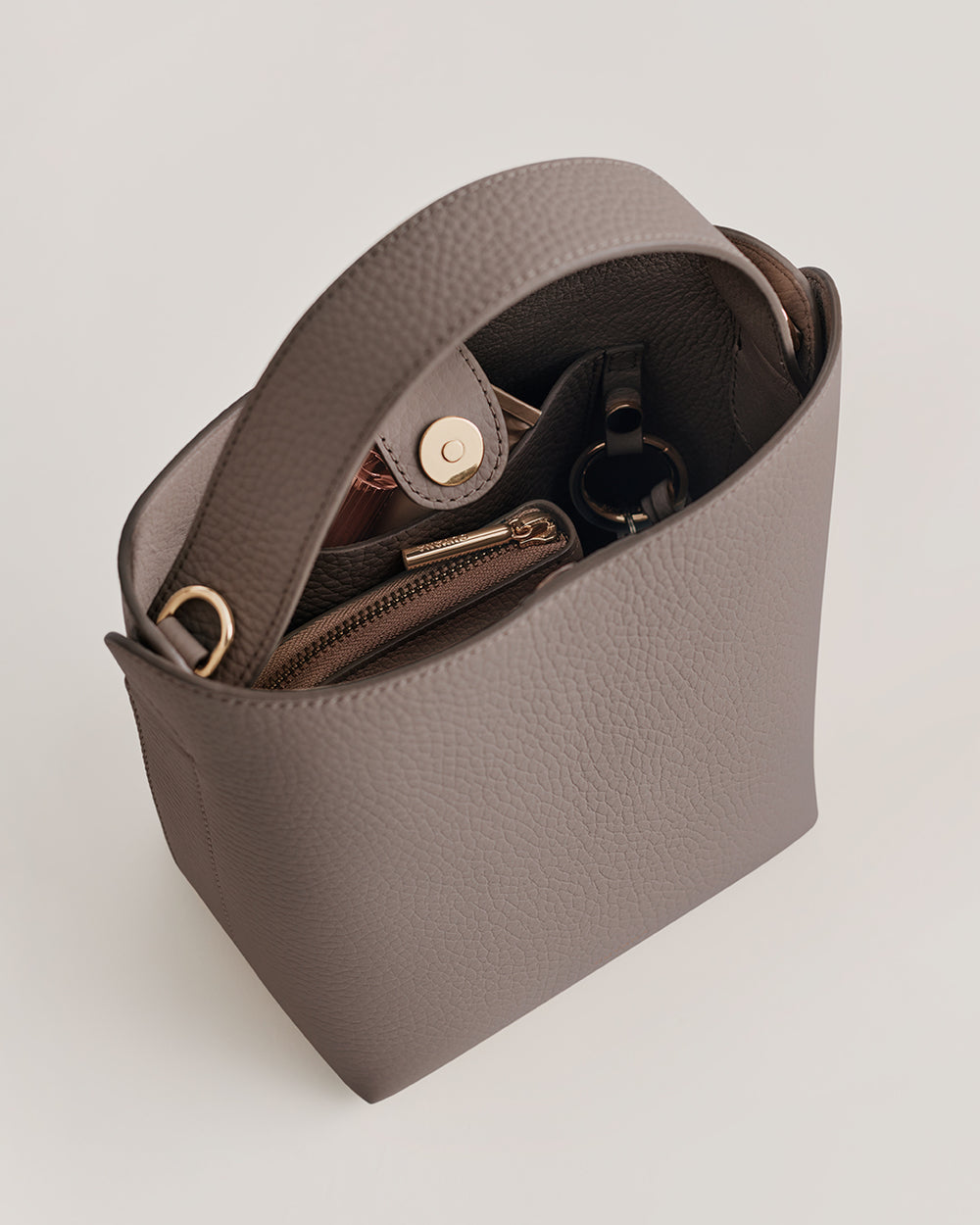 Mini Linea Bucket Bag Open handbag with wallet and small pouch inside