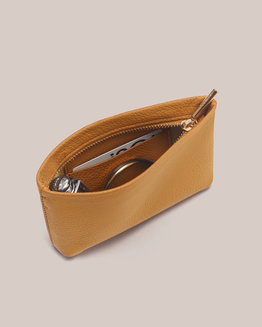 Nano Zipper Pouch Small pouch with zipper containing various items inside