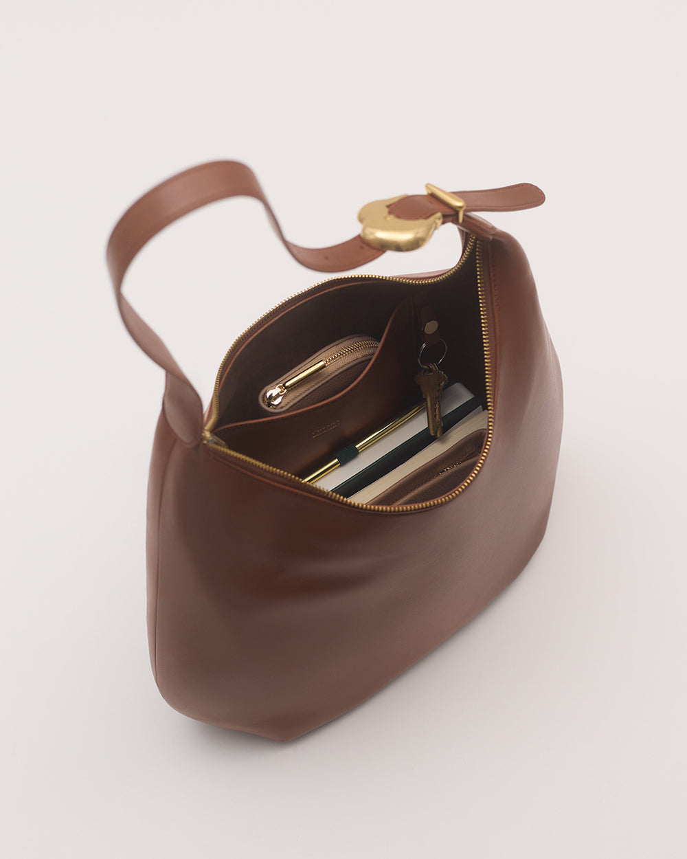 Oversized Celestia Bag Open handbag with contents including a wallet and keys visible