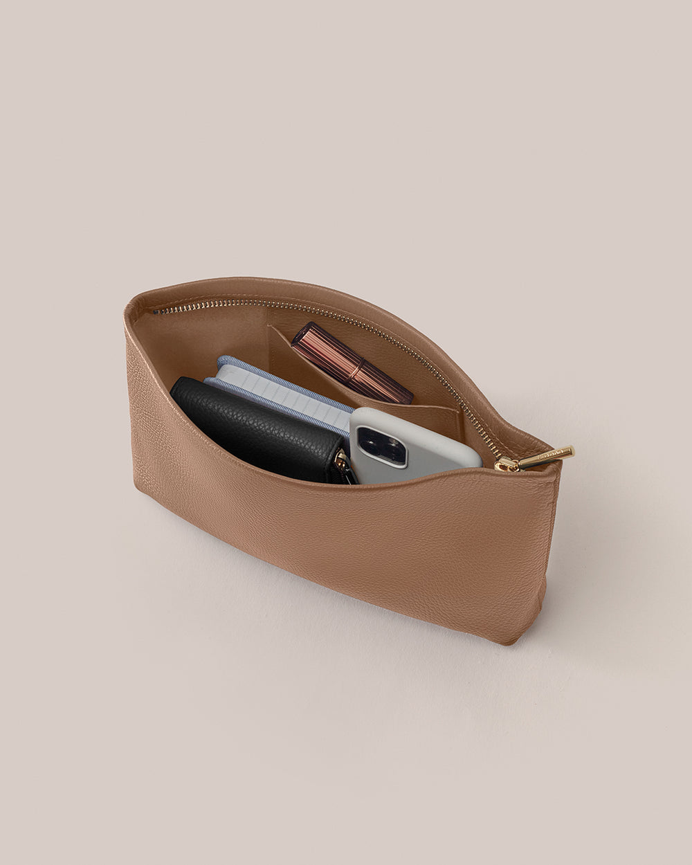 Small Zipper Pouch Open pouch with wallet, phone, and cosmetic items inside