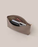 Pouch containing wallet, phone, and a few other small items.