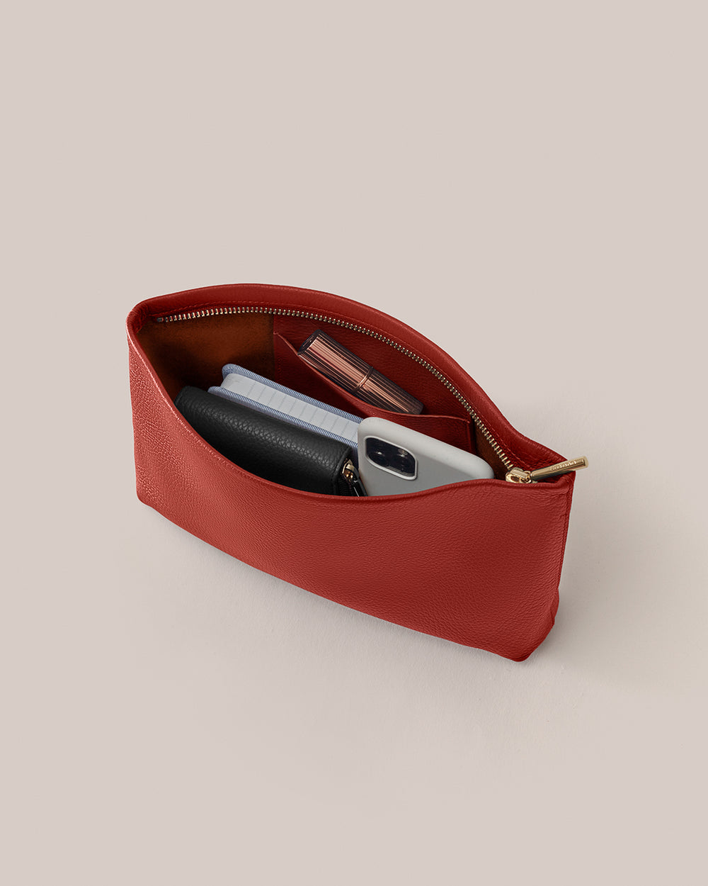 Small Zipper Pouch Open pouch with a phone, wallet, and small items inside