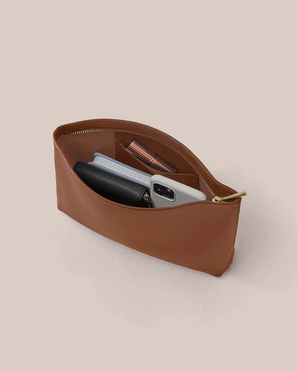 Small Zipper Pouch Open pouch containing phone, wallet, and other small items.