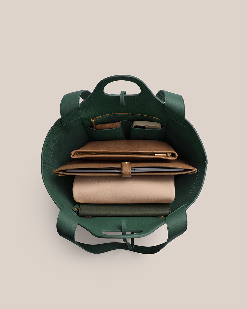 Paloma Tote Open handbag showing neatly organized contents inside.