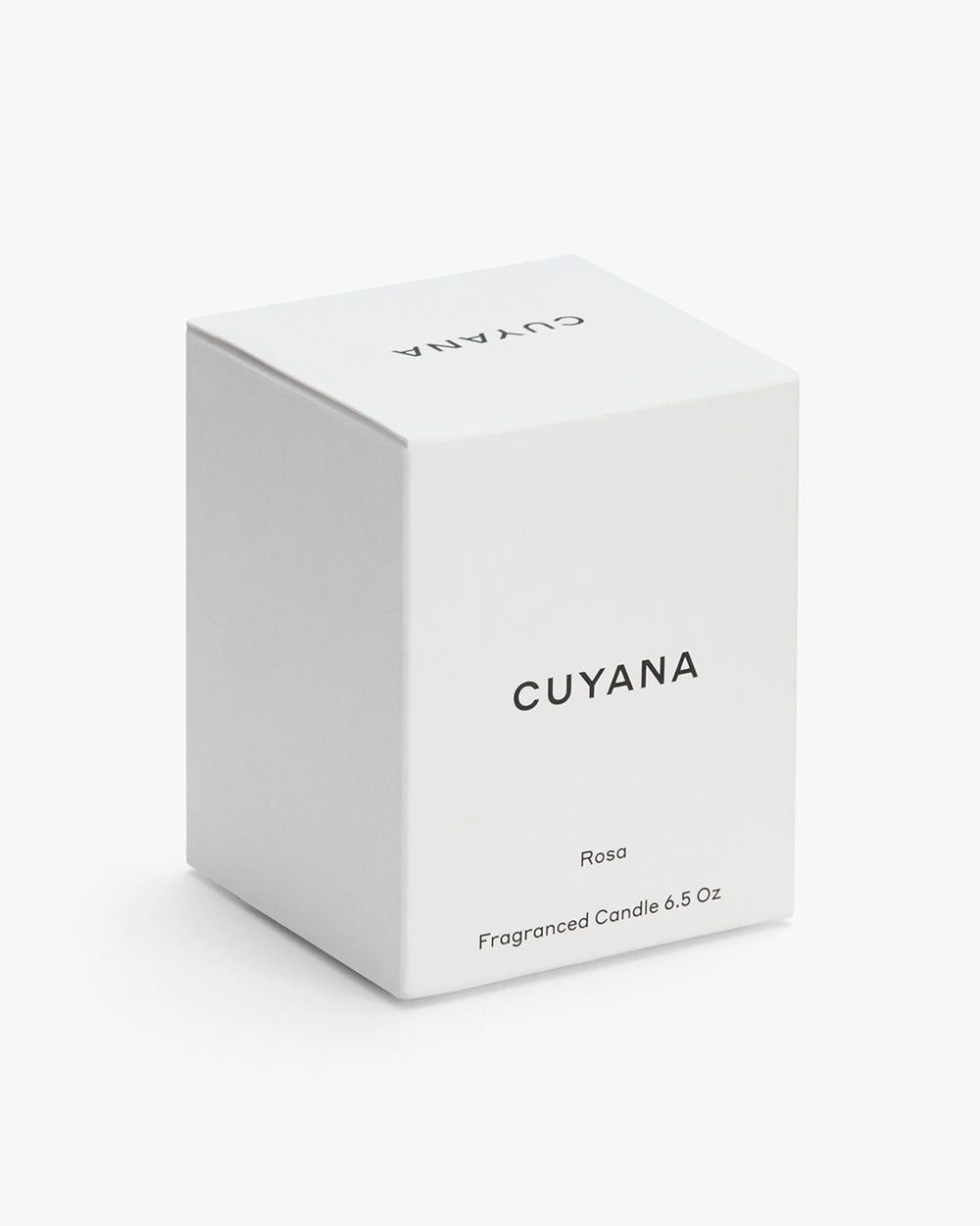 Box of Cuyana Rosa scented candle on a plain background.