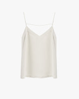 Sleeveless camisole with thin straps and a V-neckline on a plain background