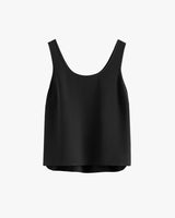 Sleeveless top with a rounded neckline hanging on plain background.