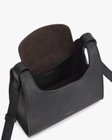 Open handbag with visible interior and two handles.