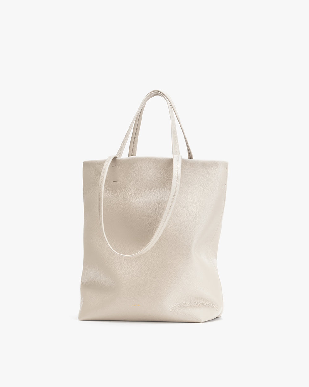 Vertical tote bag with two handles standing upright.
