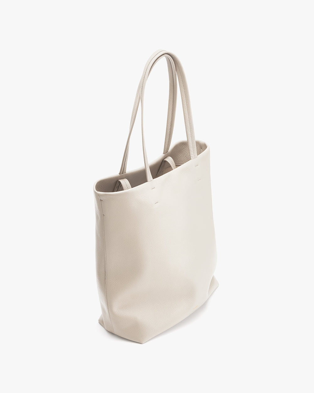 Upright tote bag with handles and a smooth texture