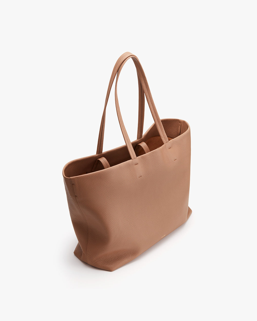 Tote bag with two handles on a plain background.