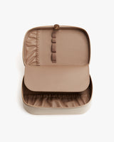 Open jewelry organizer with compartments and elastic pockets