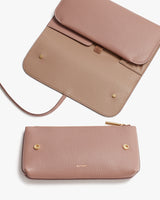 Two purses arranged vertically with one larger than the other.