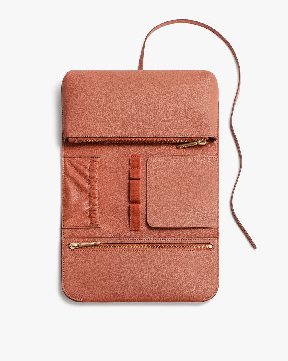 Leather crossbody bag with multiple pockets and a long strap.