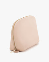 Zippered pouch standing upright.