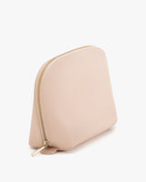 Zippered pouch standing upright.