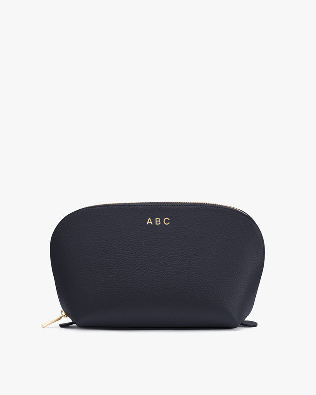 Personalized pouch with zipper and initials 'ABC'.