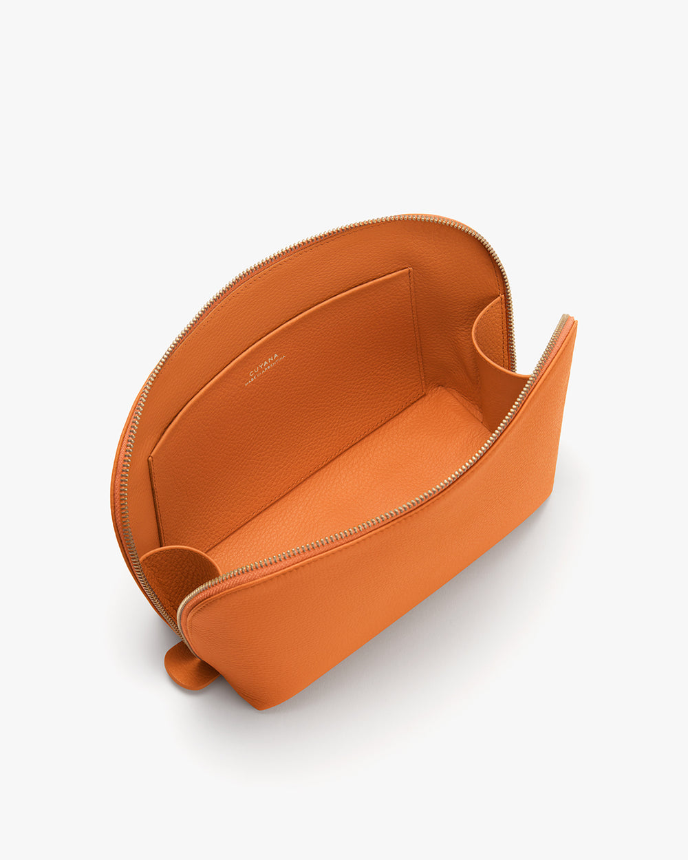 Travel Case Set Open leather bag on a plain background.