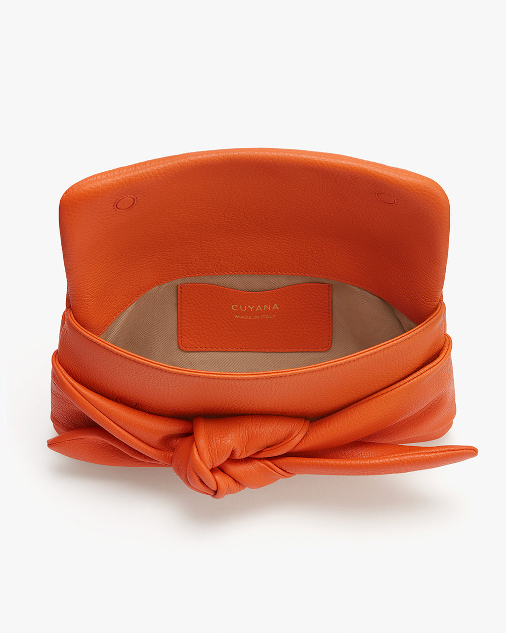 Bow Clutch Open handbag with visible interior pocket and a bow detail on the front.